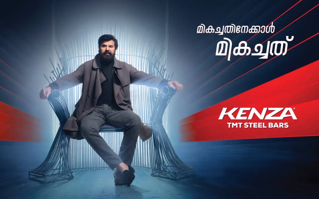 Outdoor billboard ad showcasing megastar Mammootty promoting Kenza TMT steel bars in Kochi, highlighting the tagline 'Mikachathinekkal Mikachath' for superior strength message